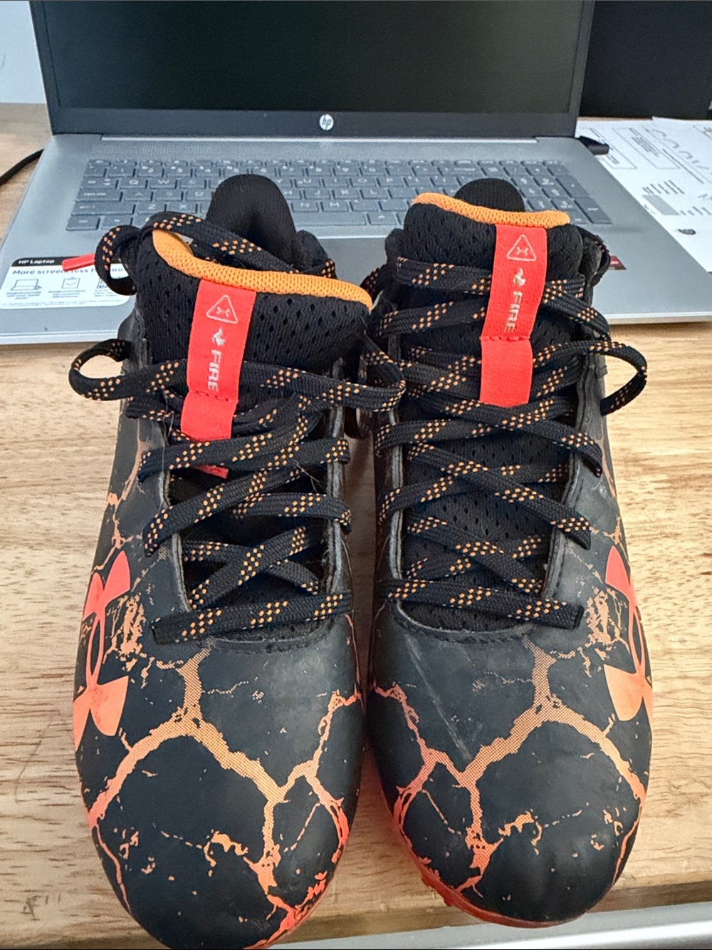 Under Armour Black Athletic Cleats with Orange Accents size 2y